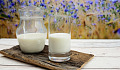A pitcher and glass of milk. Image by congerdesign from Pixabay.